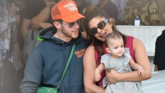 Priyanka Chopra, Nick Jonas with daughter Malti Marie Chopra Jonas at Mumbai airport. 